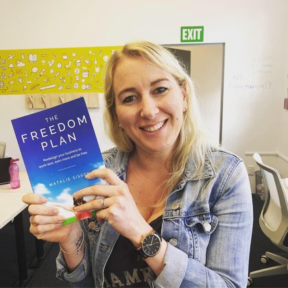 Reader holding The Freedom Plan (1)